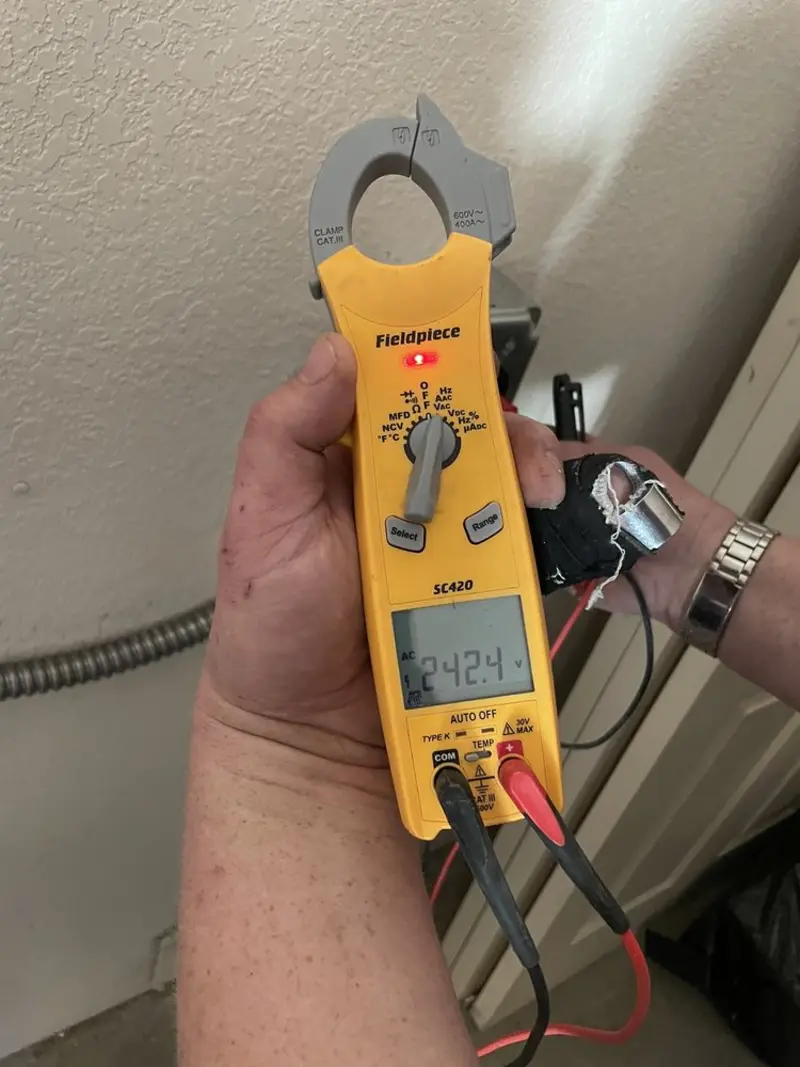 Voltage testing with clamp meter during Electrical Installation Services in Zephyrhills